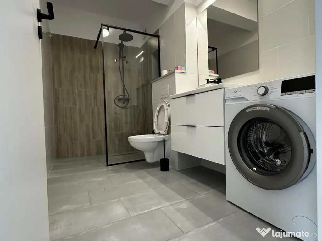 Închiriez apartament 2 camere + parcare subterana 