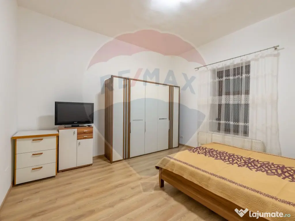 Apartament la casă de închiriat