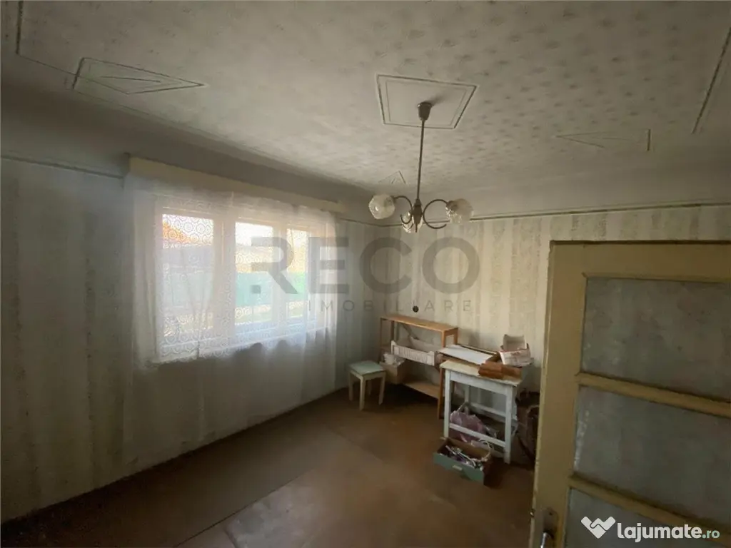 Reco casa P E cu doua apartamente 