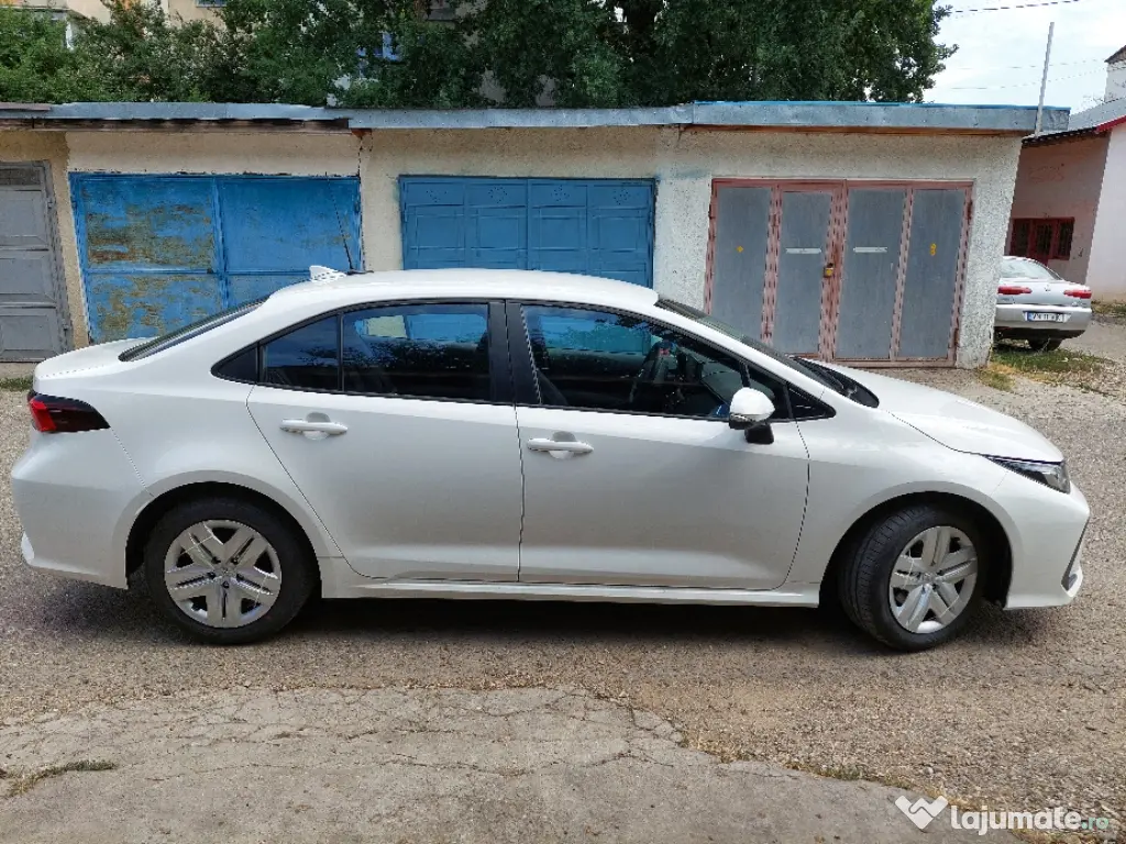 vând toyota corolla GPL 