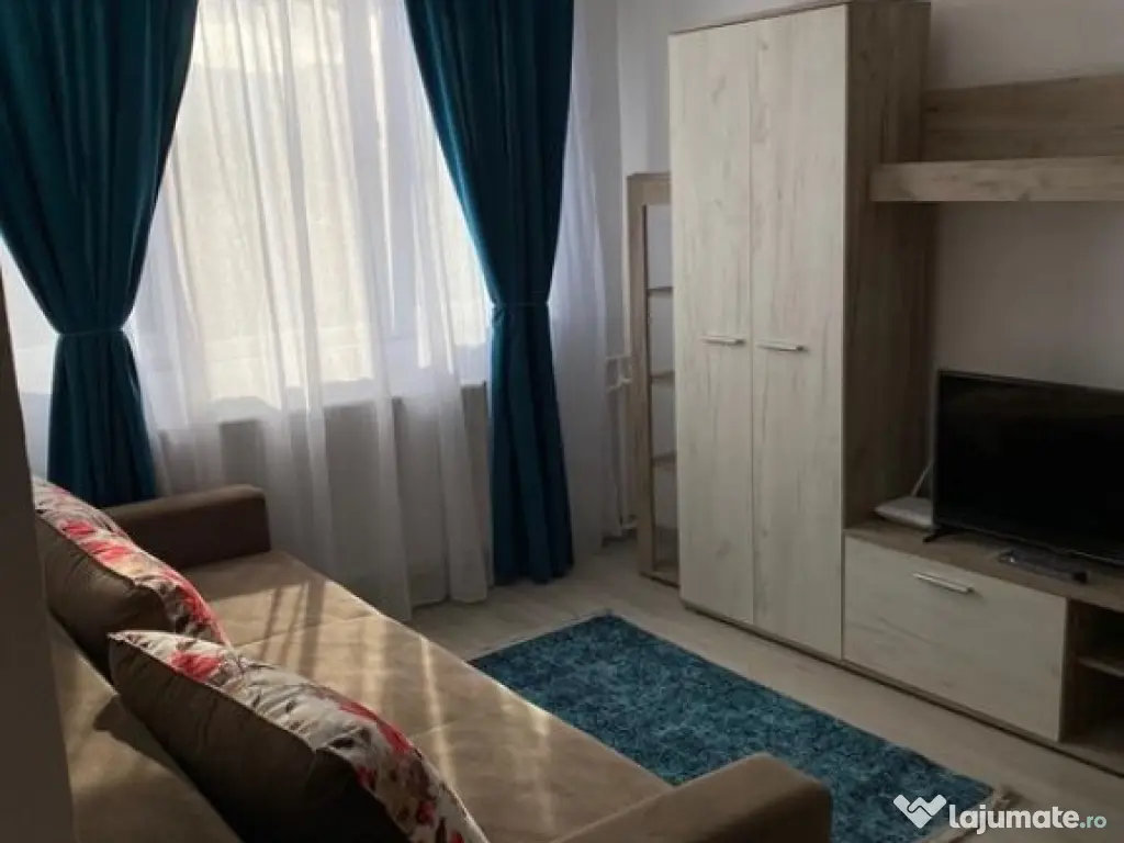 De inchiriat apartament o camera