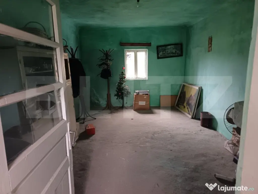 Casa renovabila, cu un teren 2000 m, intr-o zona linistita