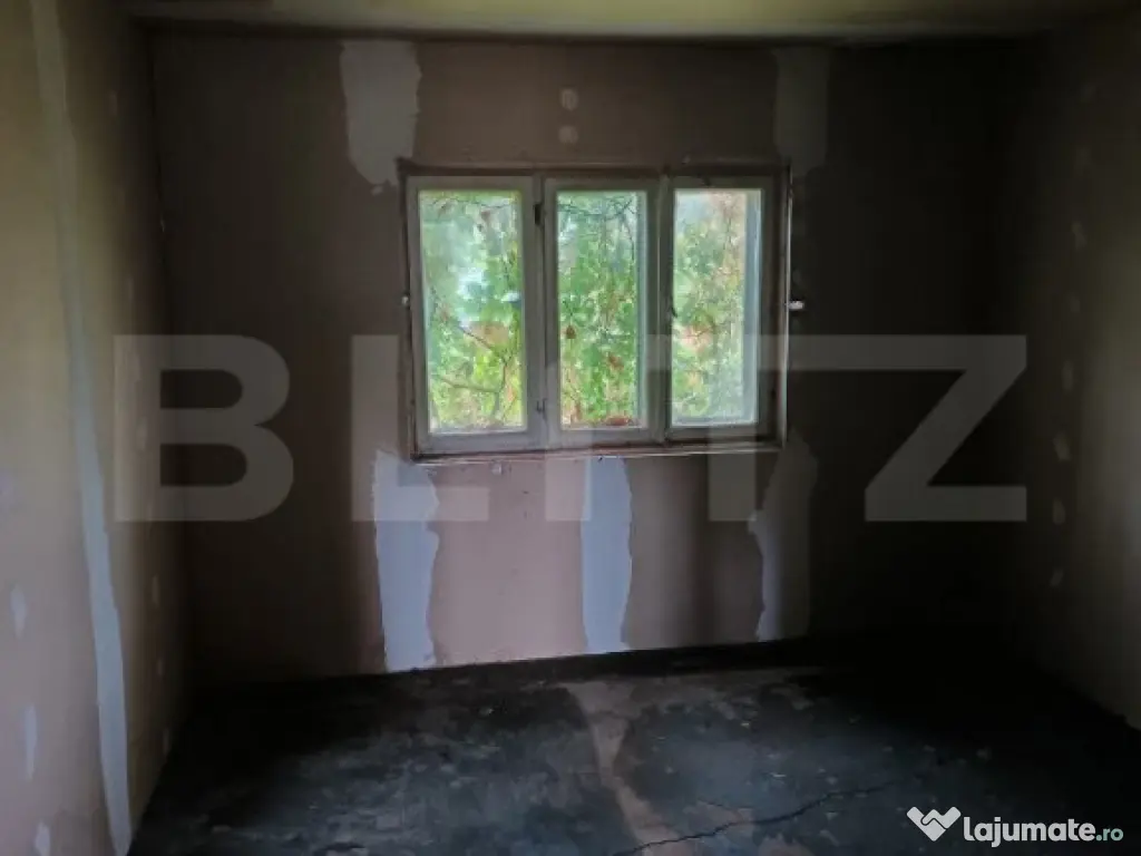 Casa renovabila, cu un teren 2000 m, intr-o zona linistita