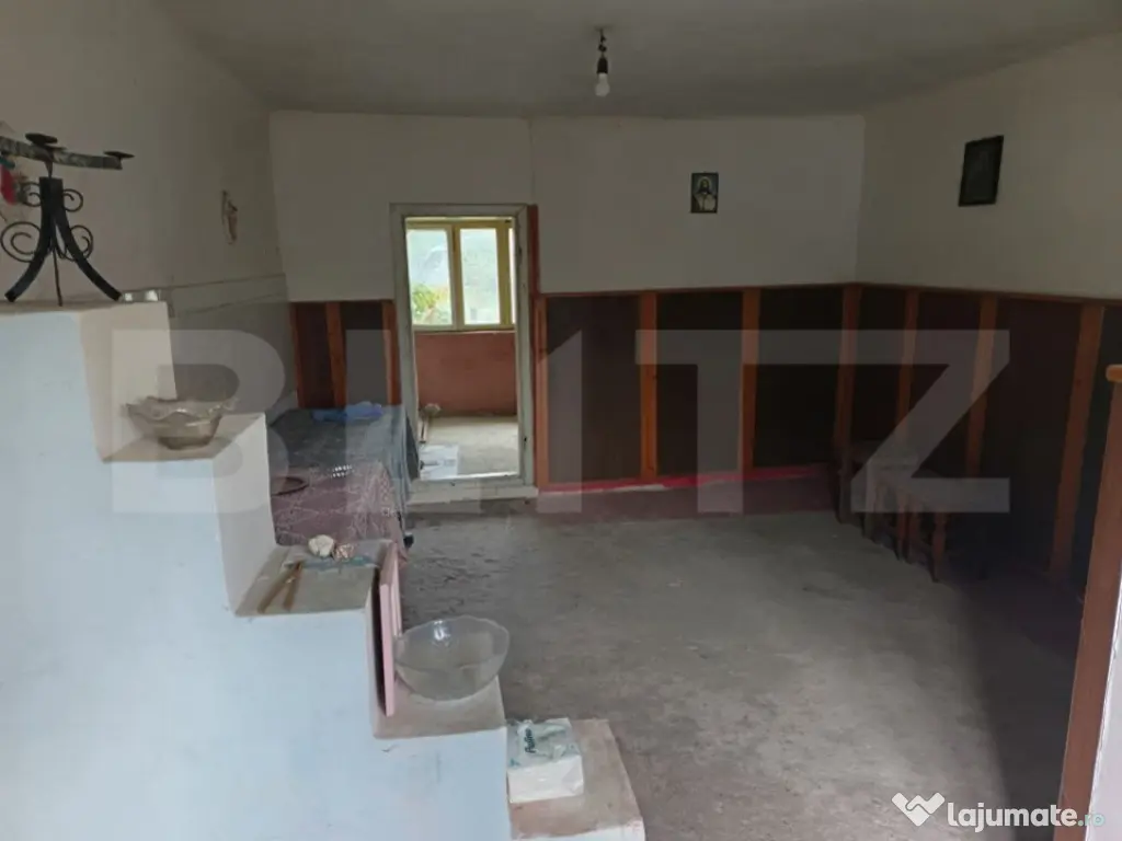 Casa renovabila, cu un teren 2000 m, intr-o zona linistita