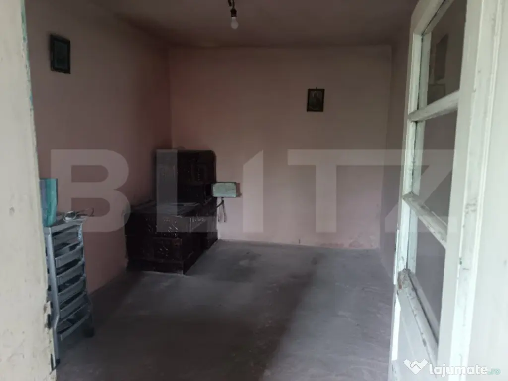 Casa renovabila, cu un teren 2000 m, intr-o zona linistita