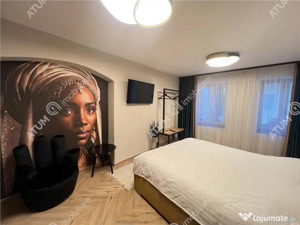 Apartament renovat cu 2 camere si terasa in zona Tribunei di 