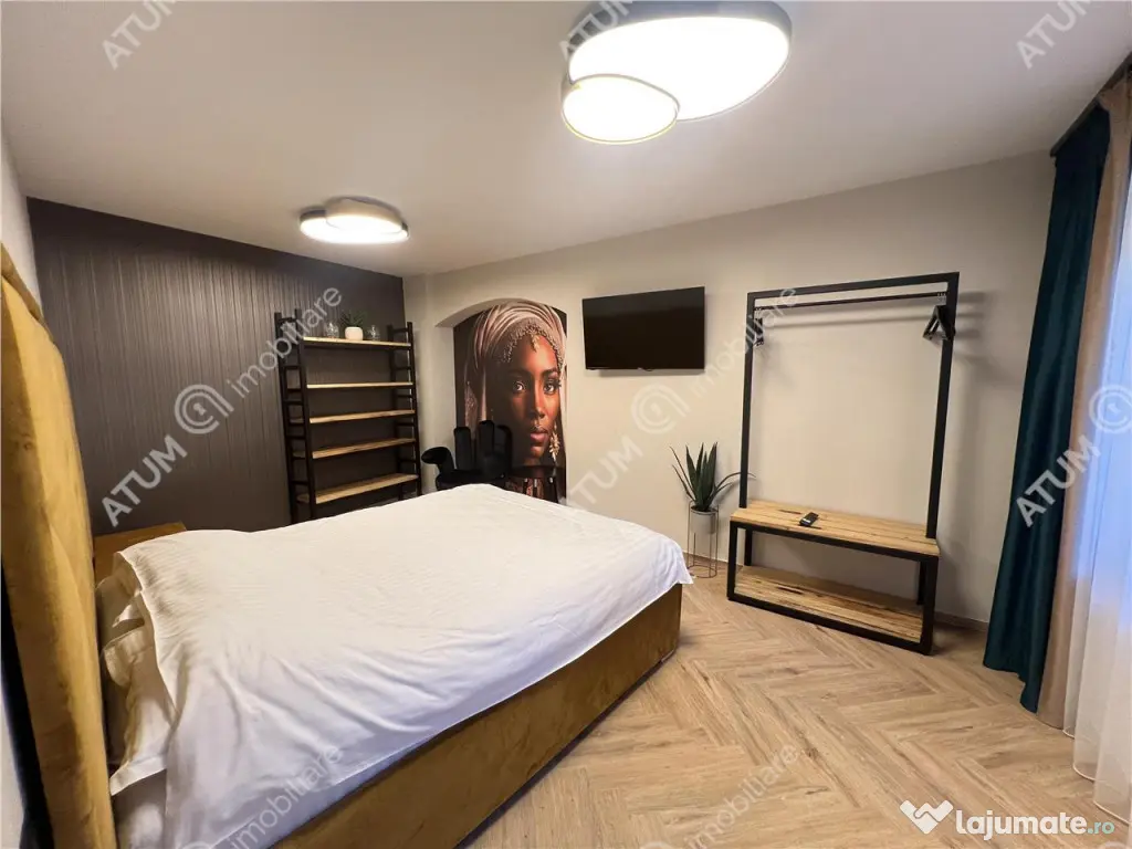 Apartament renovat cu 2 camere si terasa in zona Tribunei di 