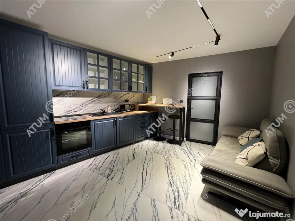 Apartament renovat cu 2 camere si terasa in zona Tribunei di 