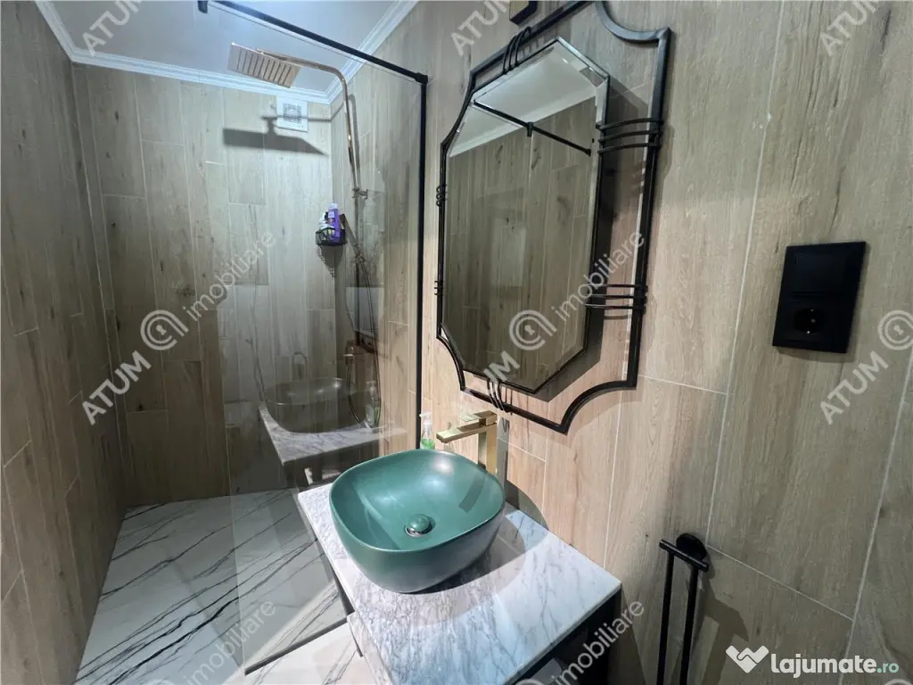 Apartament renovat cu 2 camere si terasa in zona Tribunei di 