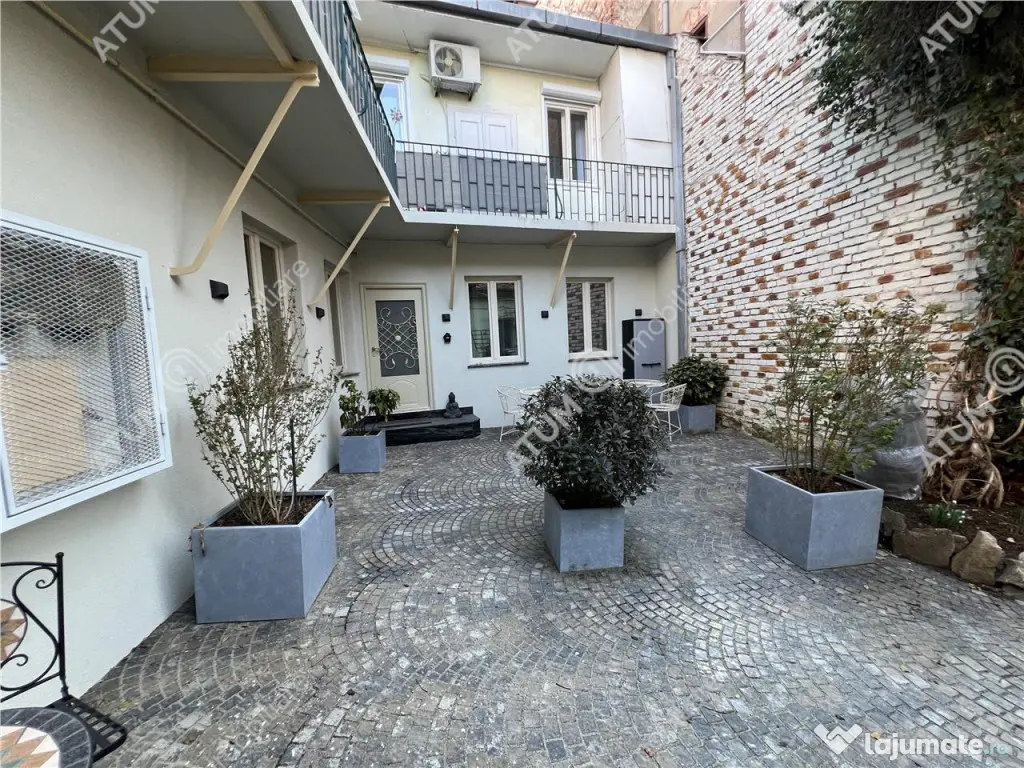 Apartament renovat cu 2 camere si terasa in zona Tribunei di 