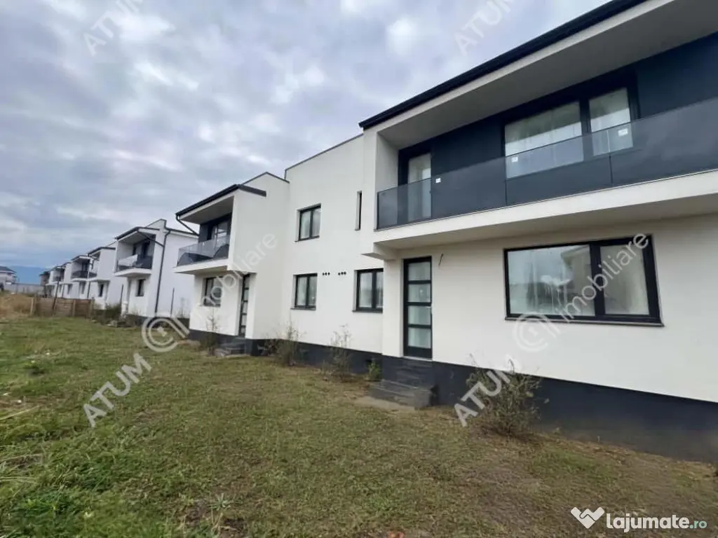 Casa cu 3 camere 2 bai si curte de 170 mp zona Calea Cisnadi