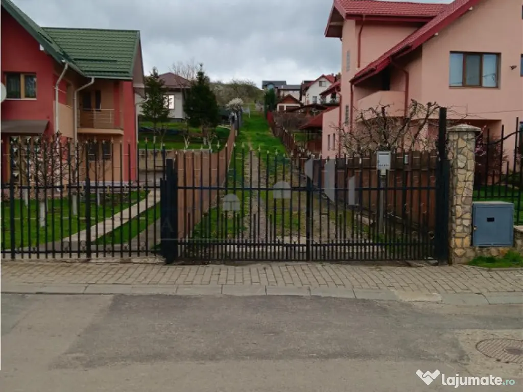 Bucium Teren 570mp la 400ml. de rond cu utilitati 