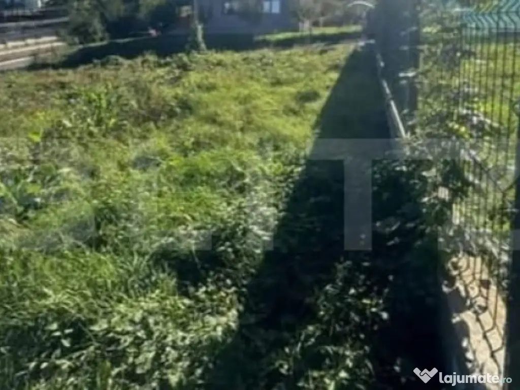 Teren 400 mp intravilan, strada principala, 2 deschideri, To