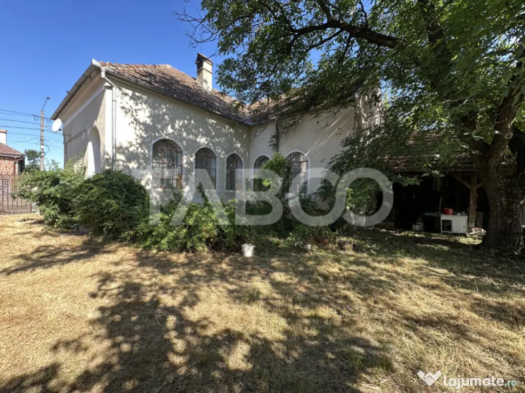Casa cu potential de investitie in centrul satului 1540 mp t 