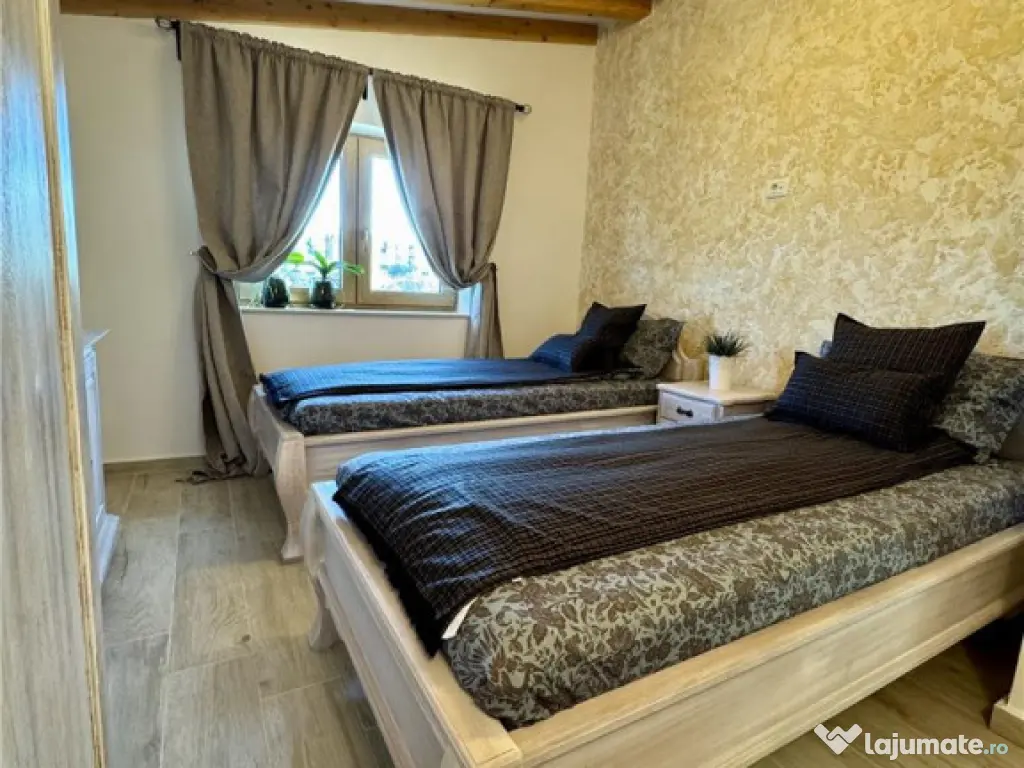 Casa de 4 camere , zona Tractorul 