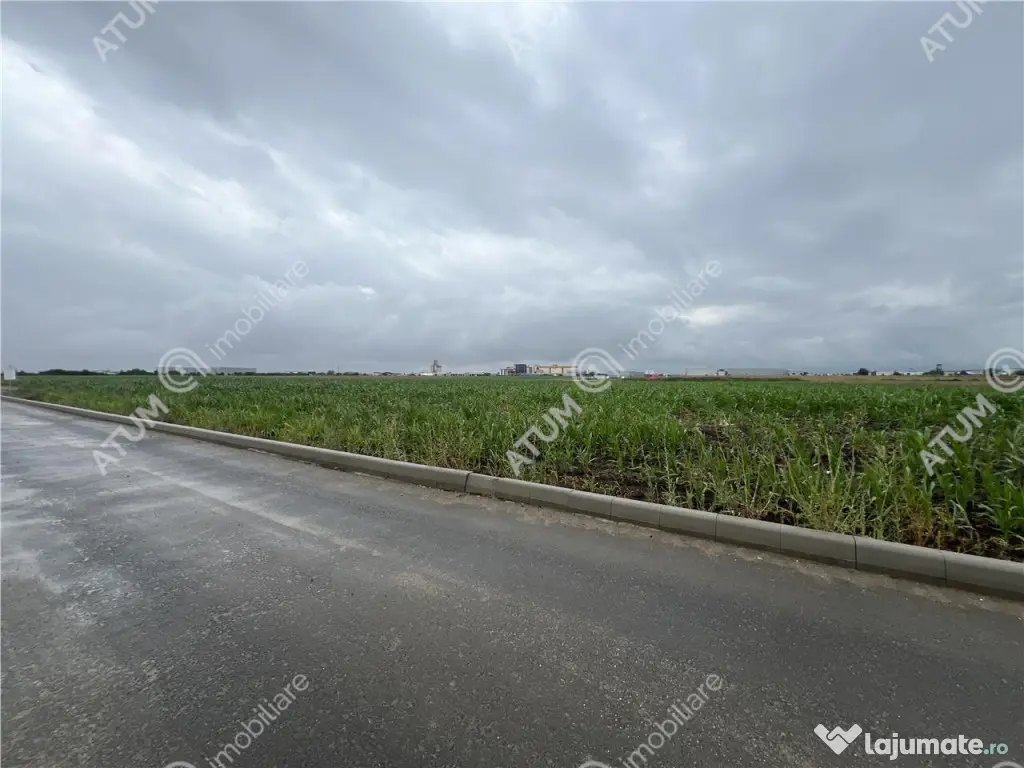 Teren intravilat de 9000 mp cu PUZ situat in zona Industrial