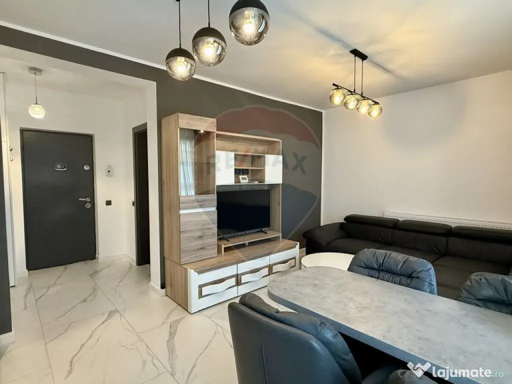 Apartament modern, cu curte și două locuri de parcare-b...