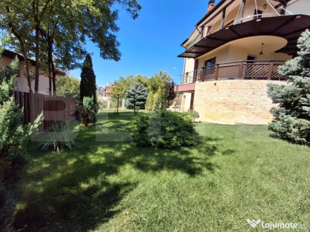Proprietate elegantă cu teren mare și garaj în Bucium, pe