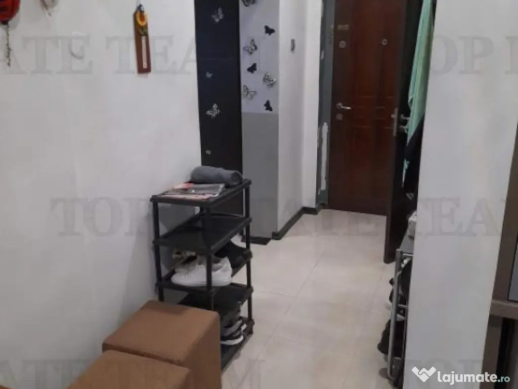 Apartament 2 camere compartimentat parter si demisol, zona 