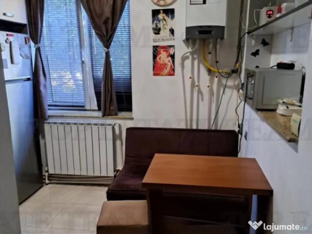 Apartament 2 camere compartimentat parter si demisol, zona 