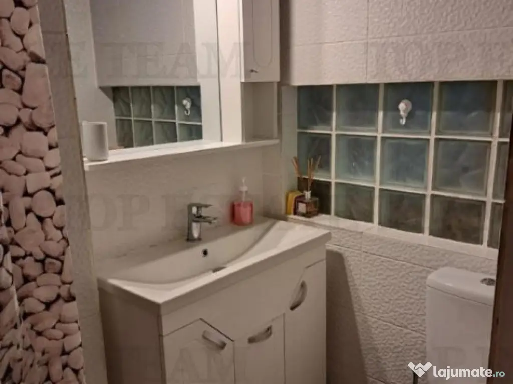 Apartament 2 camere compartimentat parter si demisol, zona 