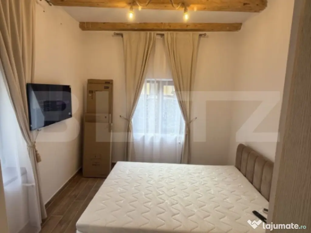 Garsonieră 28mp, prima închiriere, singur în curte cu ter 