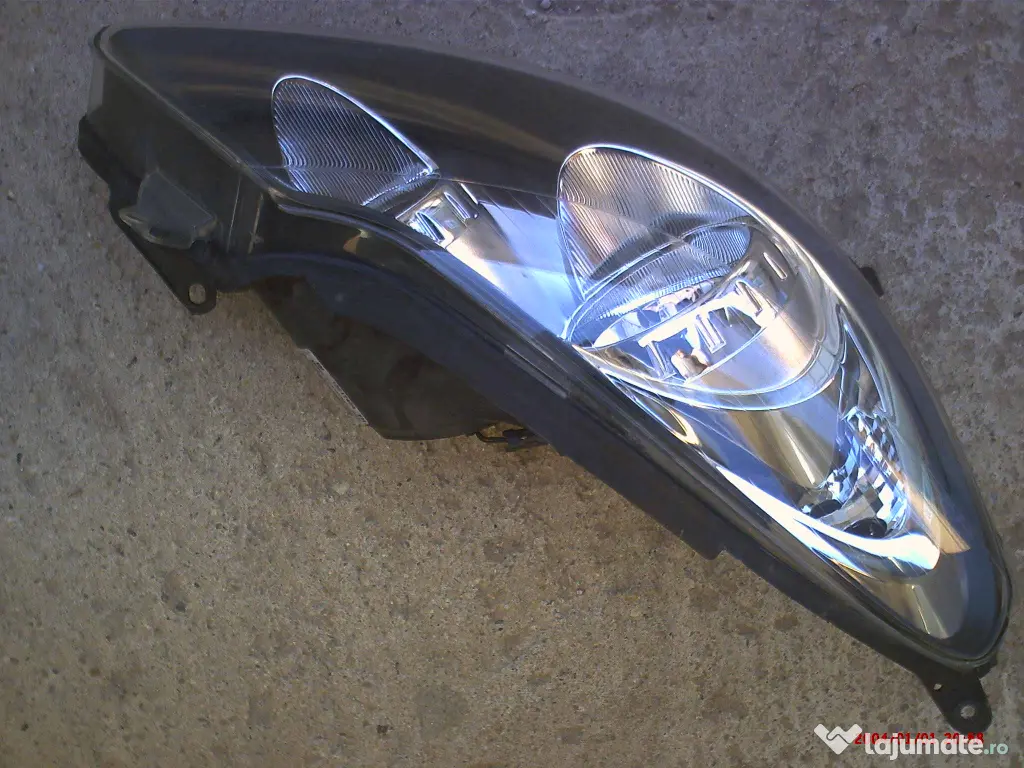 faruri Opel Corsa D fond negru 400 lei 