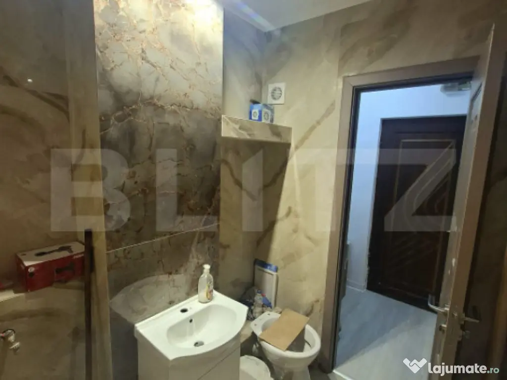 Garsonieră complet renovată de vânzare 