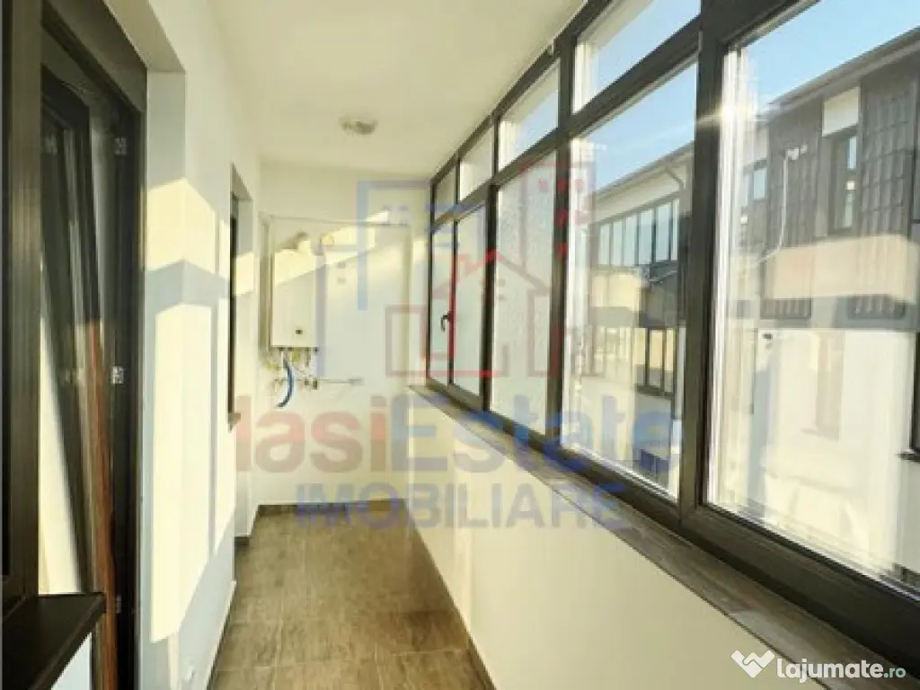 Apartament cu camere decomandat de inchiriat 