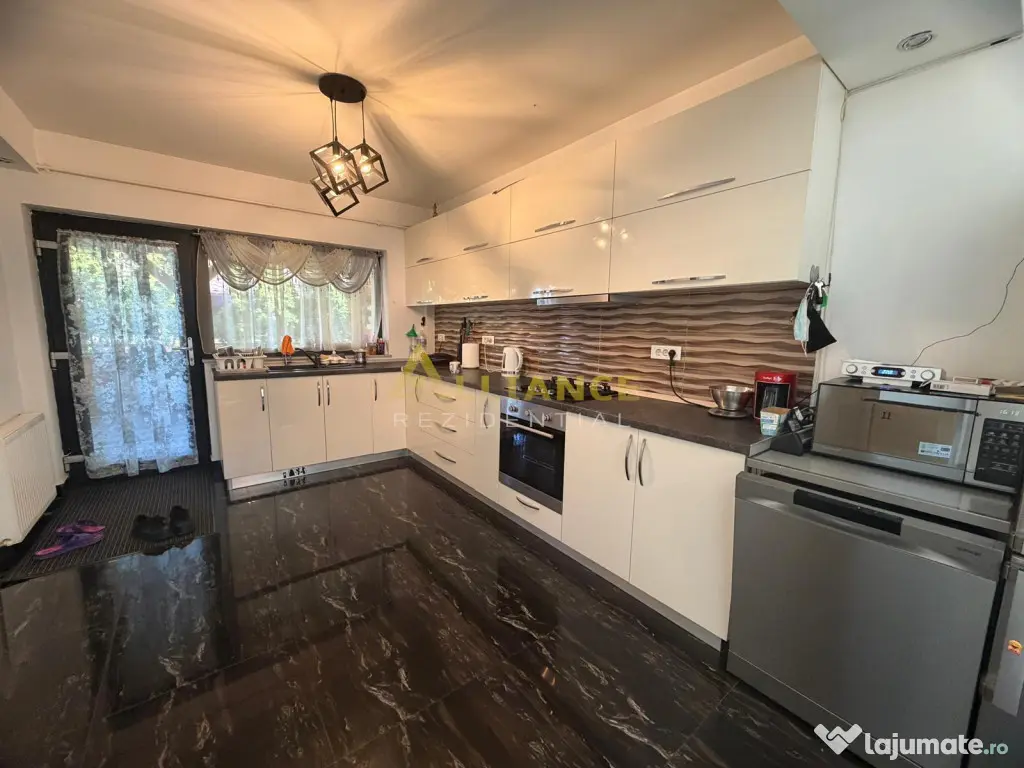 Casa mobilata si utilata- 4 camere - 2 bai - cartierul nou 