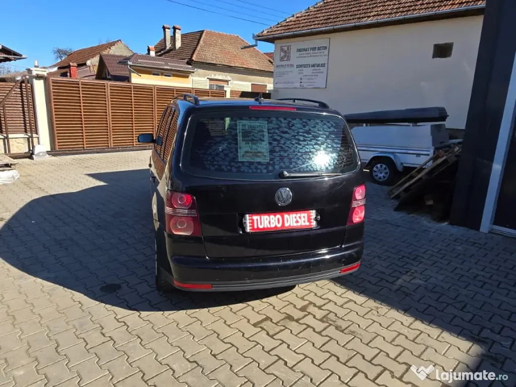 Volkswagen Touran  An 2009   Break   Diesel   293.000 km   1900 cmc 