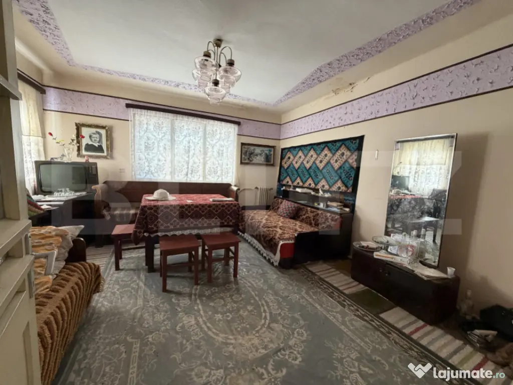 Casă cu 4 camere 120 mp și un teren de 800 mp 