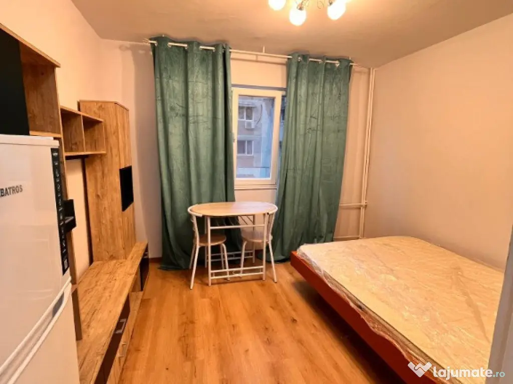 Camera de camin tip garsoniera,cu baie proprie,et2,renovata,cu chirias 