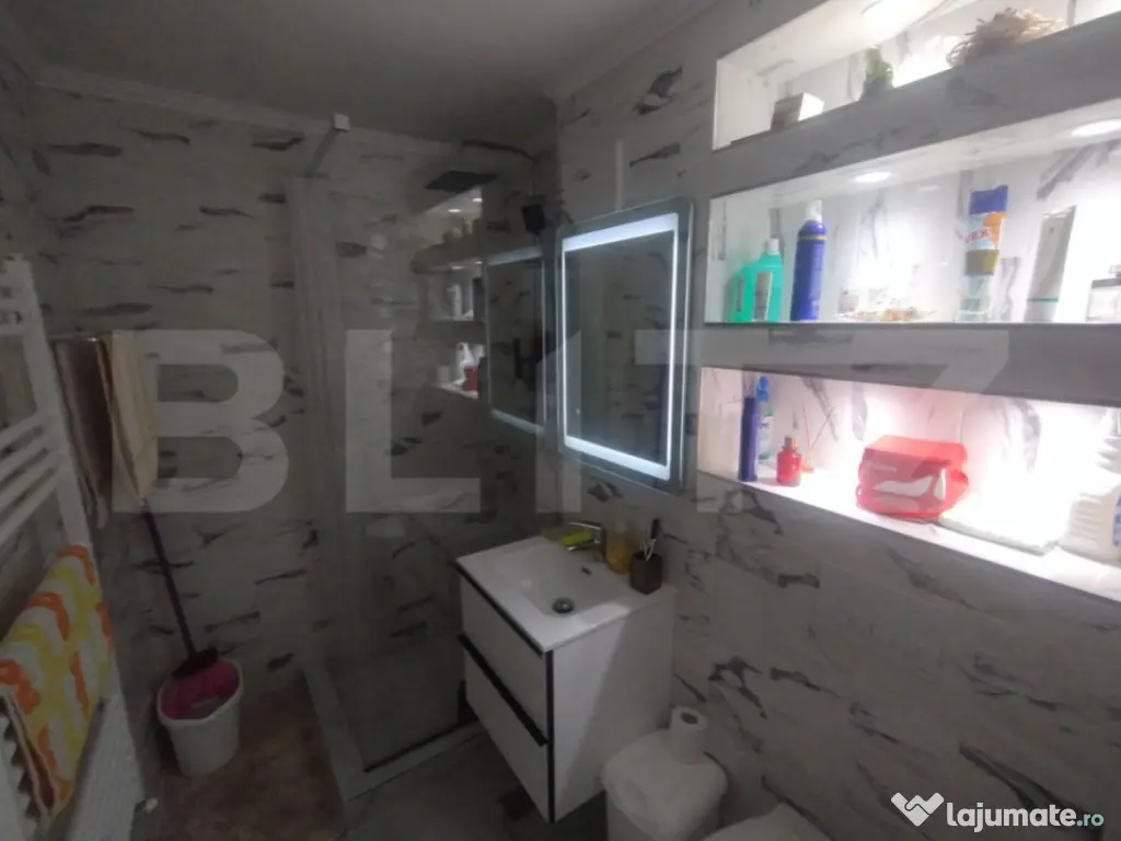 Apartament 2 camere,48mp,decomandat,etaj 3,zona centrala Nas