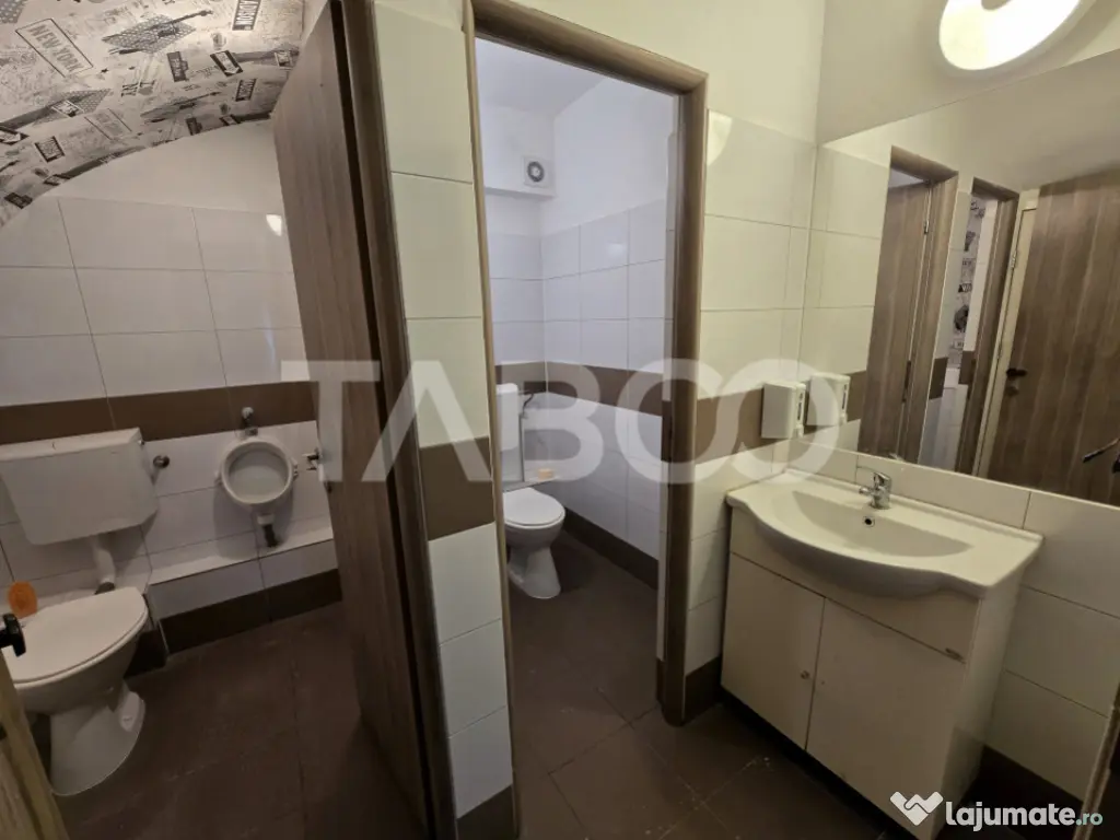 Spatiu comercial de vanzare 55 mp curte parcare zona Central 