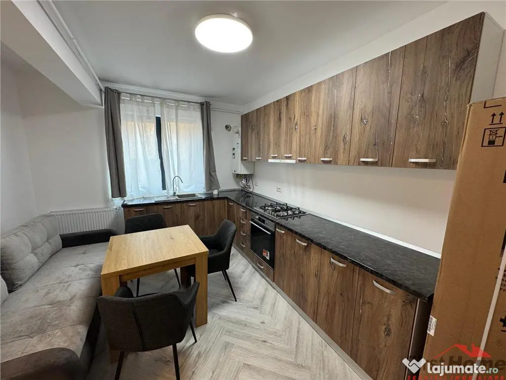 Ap 2 cam,parter,parcare, bloc nou, Scoala 2 - Piata Moldovei 