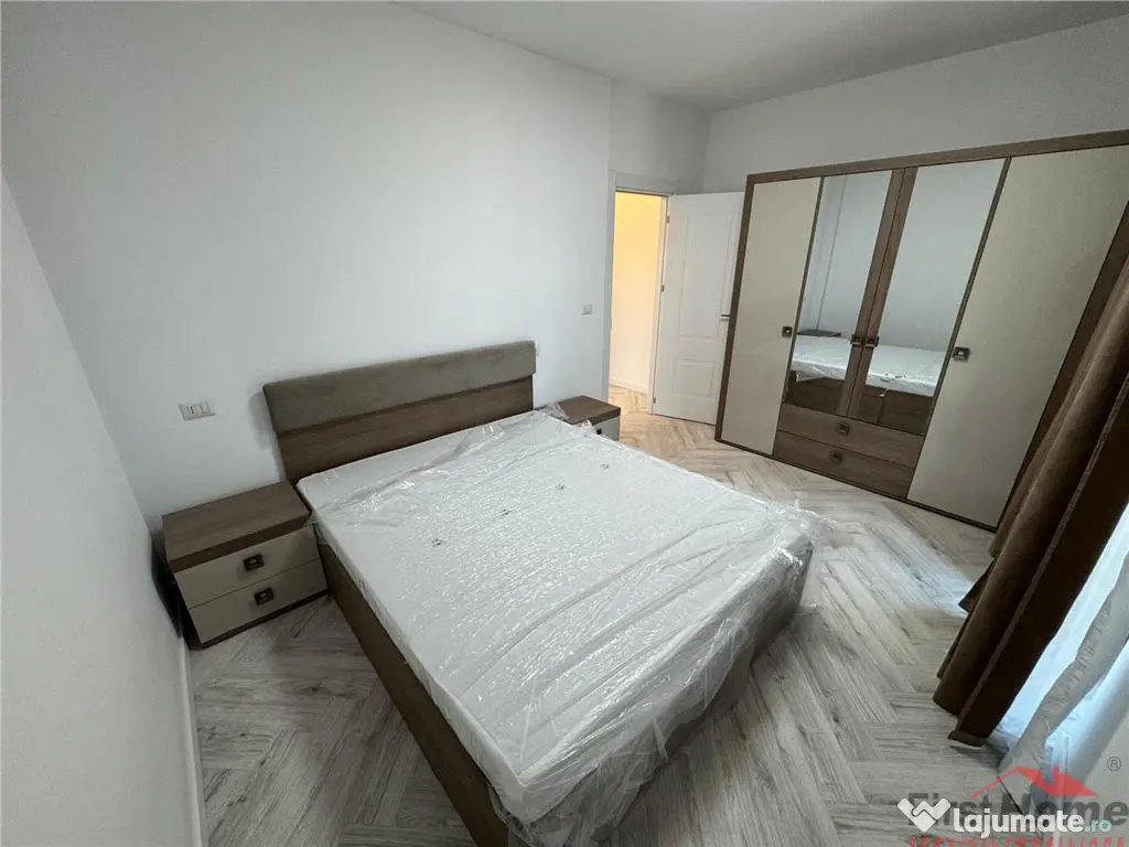 Ap 2 cam,parter,parcare, bloc nou, Scoala 2 - Piata Moldovei 