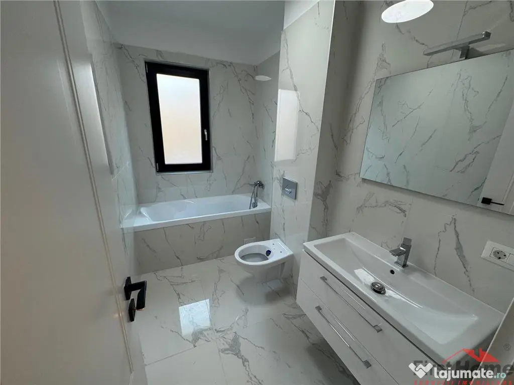 Ap 2 cam,parter,parcare, bloc nou, Scoala 2 - Piata Moldovei 