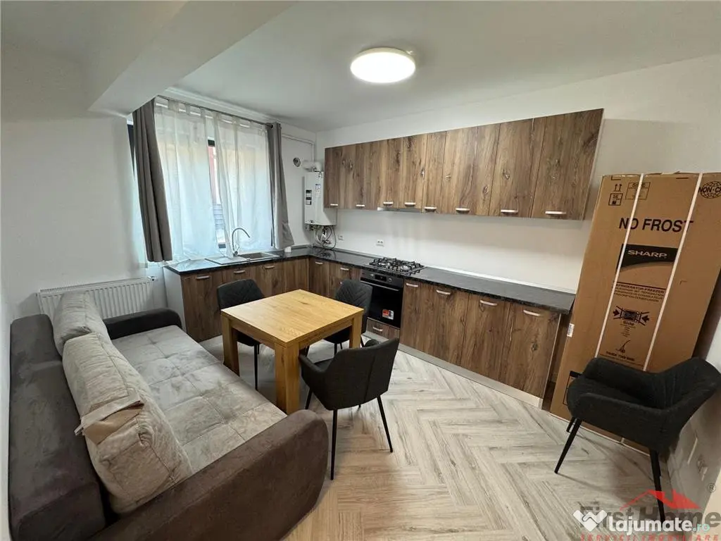 Ap 2 cam,parter,parcare, bloc nou, Scoala 2 - Piata Moldovei 