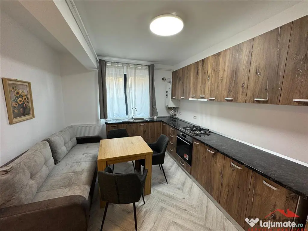 Ap 2 cam,parter,parcare, bloc nou, Scoala 2 - Piata Moldovei 