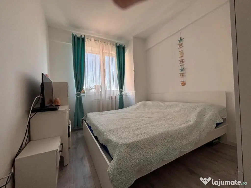 APARTAMENT CU 2 CAMERE , OPEN-SPACE, ETAJ INTERMEDIAR, CAPAT 