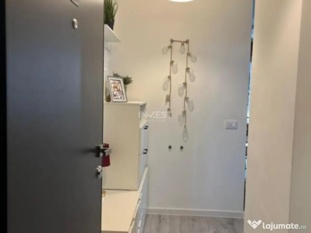 APARTAMENT CU 2 CAMERE , OPEN-SPACE, ETAJ INTERMEDIAR, CAPAT 