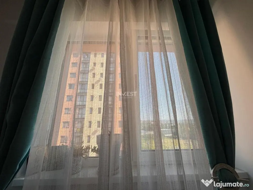 APARTAMENT CU 2 CAMERE , OPEN-SPACE, ETAJ INTERMEDIAR, CAPAT 