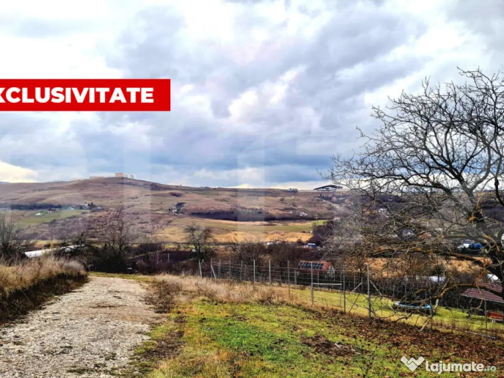 Teren intravilan 1.700 mp, front 68 m, zona Sopor