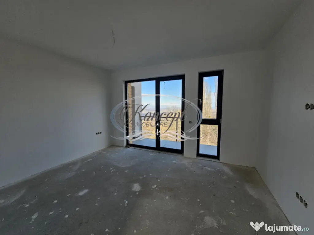 Locuinta D+P+1 Feleacu cu spatii vitrate ample 