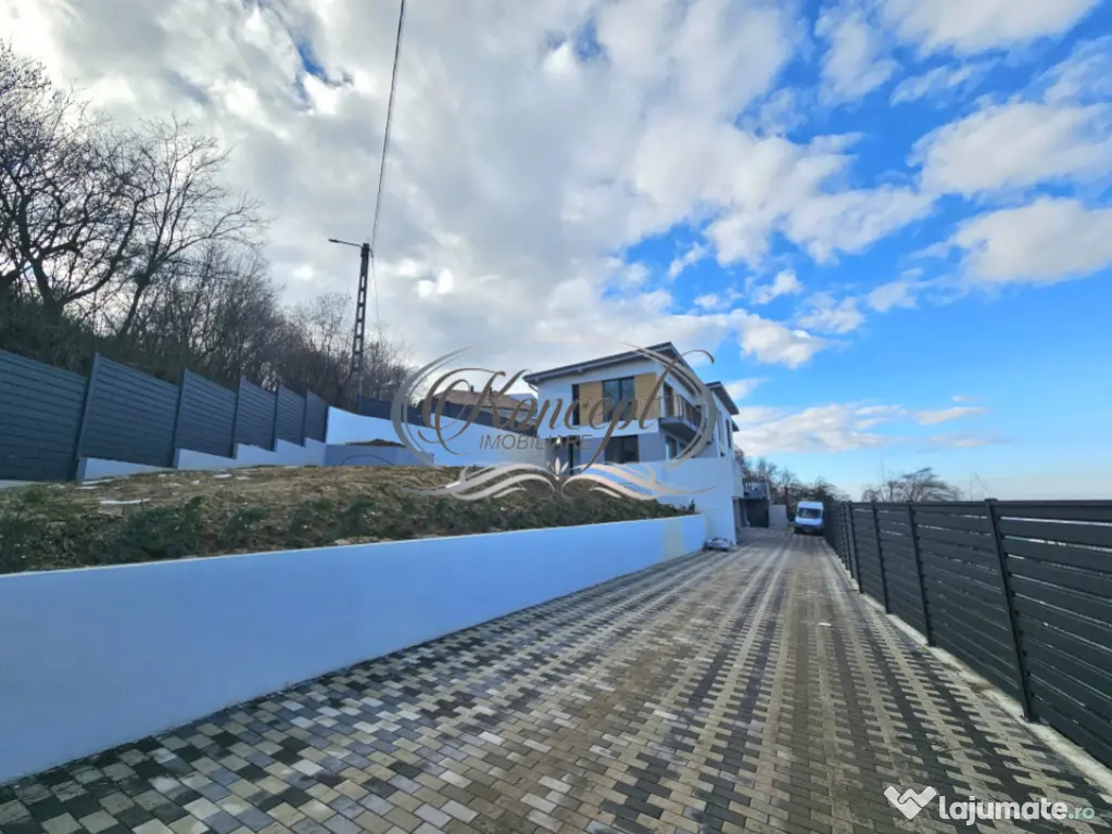 Locuinta D+P+1 Feleacu cu spatii vitrate ample 