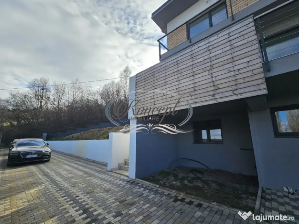 Locuinta D+P+1 Feleacu cu spatii vitrate ample 