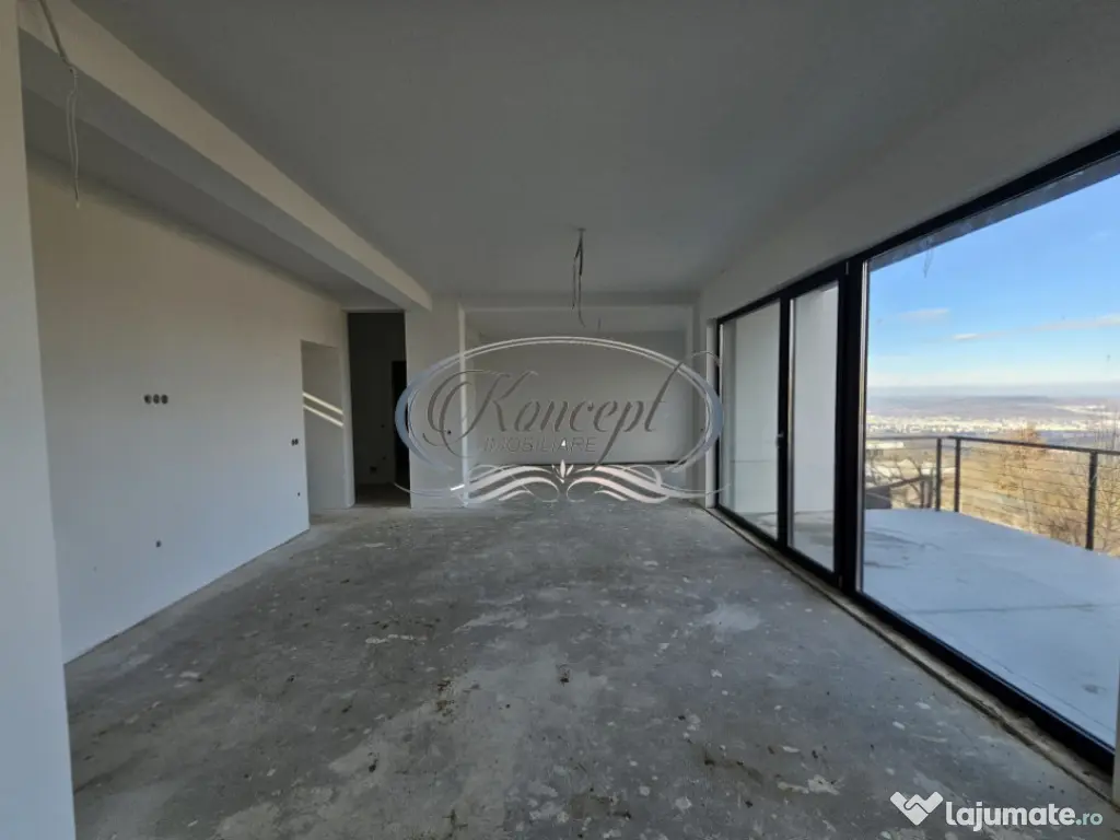 Locuinta D+P+1 Feleacu cu spatii vitrate ample 