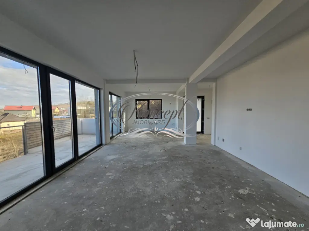 Locuinta D+P+1 Feleacu cu spatii vitrate ample 