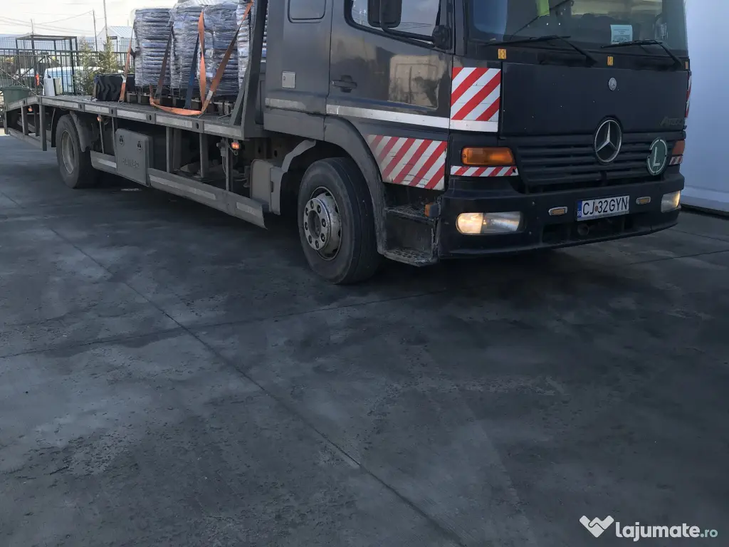 Tractez,transport autovehicule,utilaje in toata tara cu platforme auto 